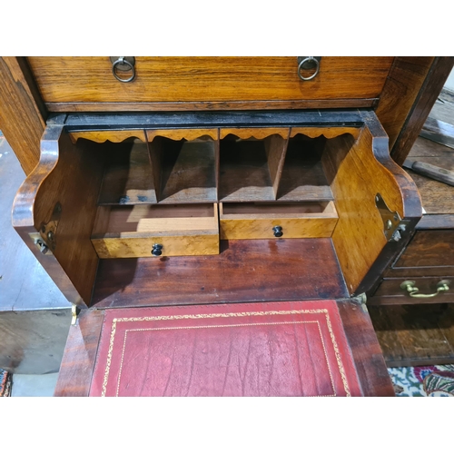 444 - A Victorian rosewood Secretaire Wellington Chest with two drawers above the fitted double secretaire... 