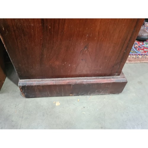 444 - A Victorian rosewood Secretaire Wellington Chest with two drawers above the fitted double secretaire... 