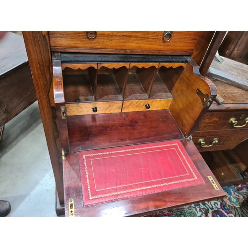 444 - A Victorian rosewood Secretaire Wellington Chest with two drawers above the fitted double secretaire... 