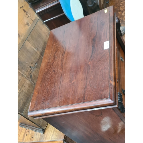 444 - A Victorian rosewood Secretaire Wellington Chest with two drawers above the fitted double secretaire... 