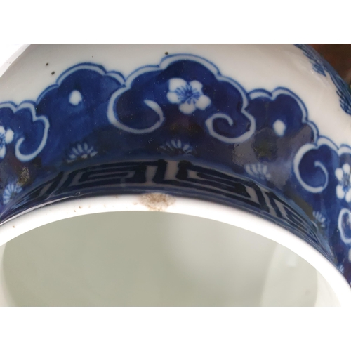 557 - A pair of Chinese blue and white Jars and Covers of baluster form with design of figures and animals... 