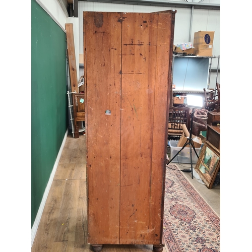 47 - A mahogany Standing Corner Cupboard with glazed top door enclosing three fitted shelves, above panel... 