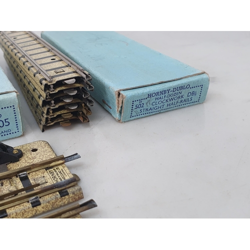 1001 - Three boxes of Hornby Dublo clockwork Track to include Points in full working and in near mint condi... 