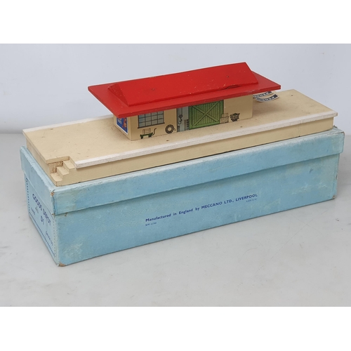 1002 - A boxed Hornby Dublo pre-war Goods Depot with red roof with two loose original type station 'Penrith... 