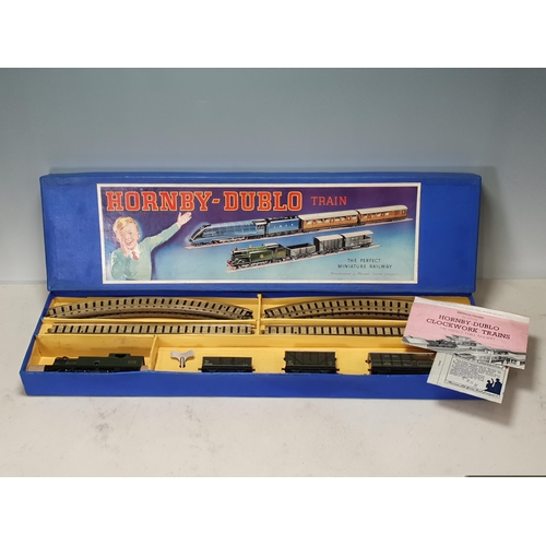 1003 - A boxed Hornby Dublo pre-war DG7 clockwork GWR Goods Set. This is a truly outstanding set, the locom... 