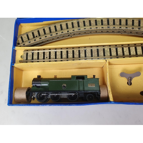 1003 - A boxed Hornby Dublo pre-war DG7 clockwork GWR Goods Set. This is a truly outstanding set, the locom... 