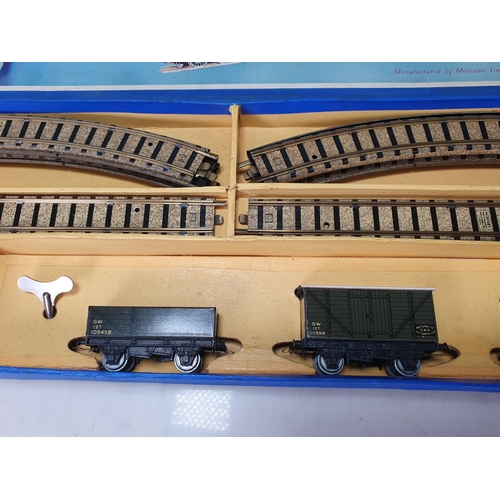 1003 - A boxed Hornby Dublo pre-war DG7 clockwork GWR Goods Set. This is a truly outstanding set, the locom... 