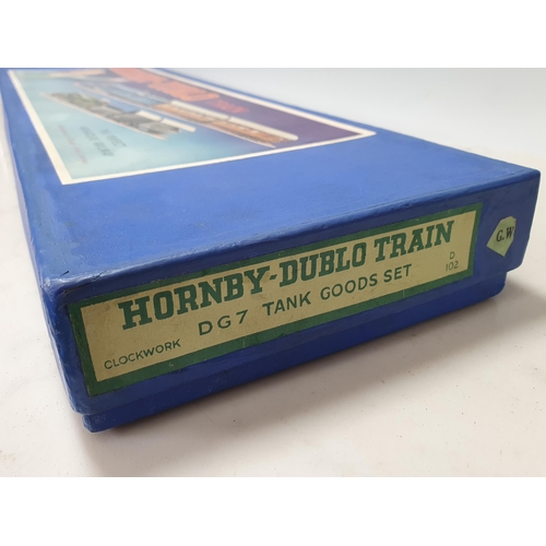 1003 - A boxed Hornby Dublo pre-war DG7 clockwork GWR Goods Set. This is a truly outstanding set, the locom... 