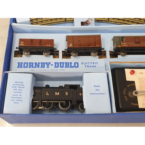 1062 - A boxed Hornby Dublo EDG7 LMS Goods Set, contents are superb and unused. Box base in superb conditio... 