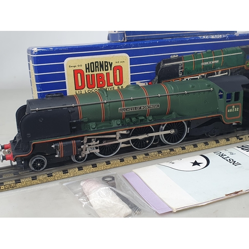 1075 - A rare boxed Hornby Dublo L12 'Duchess of Montrose' Locomotive in unused condition, showing no signs... 