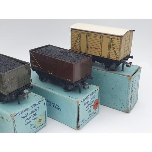 1100 - Four boxed Hornby Dublo post-war, pre-nationalisation Wagons in pre-war boxes, all boxes carry 1948 ... 