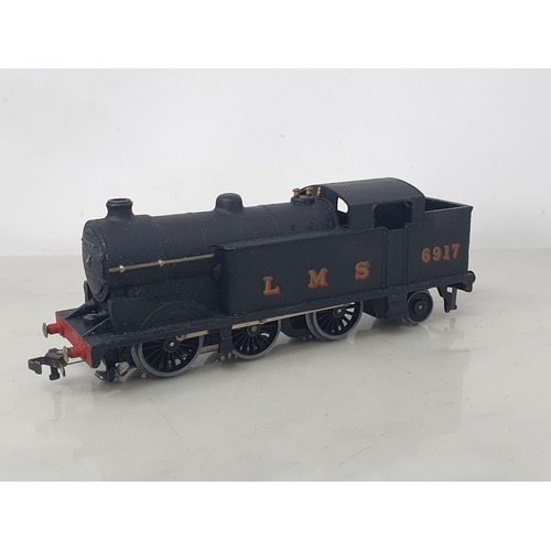 1102 - A boxed Hornby Dublo EDG7 LMS Royal Scot Set, second issue type without gold leaf transfers. Locomot... 