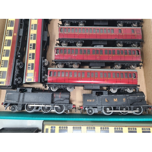 1201 - Two unboxed Hornby Dublo 3-rail 0-6-2T Locomotives, 6x unboxed B.R. Suburban Coaches, two B.R. Corri... 