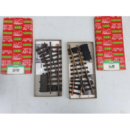 1236 - A box containing 1x 1200E RH Point, 1x 1210E LH Point and various LGB short Straight and Curved Trac... 