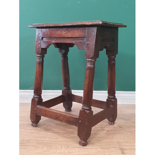 615 - An antique oak Joint Stool in the 17th Century manner on barrel turned supports 1ft 11in H x 1ft 6in... 