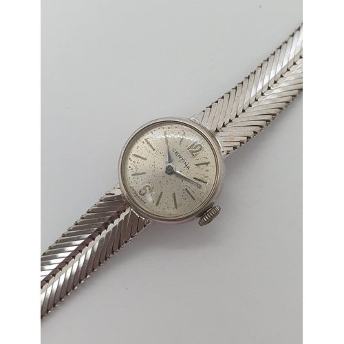 151 - A lady's vintage Certina Wristwatch the round silvered dial with applied baton and Arabic hour marke... 