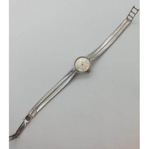 151 - A lady's vintage Certina Wristwatch the round silvered dial with applied baton and Arabic hour marke... 