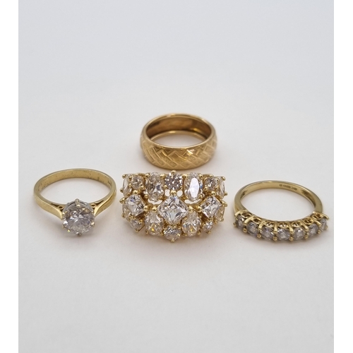 161 - Three 14ct gold Rings set CZ and a 14ct gold Wedding Band, approx 12gms all in