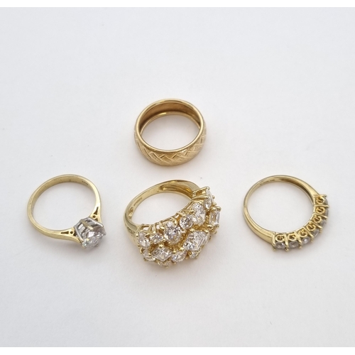 161 - Three 14ct gold Rings set CZ and a 14ct gold Wedding Band, approx 12gms all in