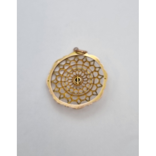 173 - An openwork circular Pendant set blue stone, stamped 333, approx 1.7gms