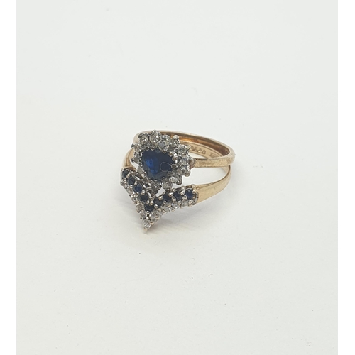 176 - A heart-shaped Sapphire and Diamond Cluster Ring claw set sapphire within a frame of single cut diam... 