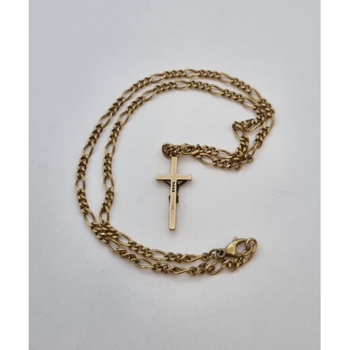 189 - A 9ct Gold Figaro Chain stamped 375 and a 9ct Gold Crucifix, full hallmarks, 9gms