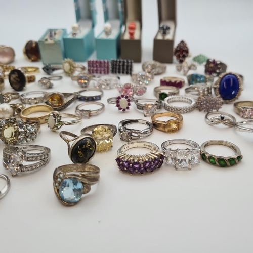 199 - A large collection of mostly silver Dress Rings set various stones