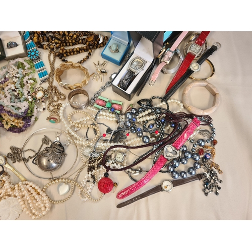 210 - A collection of Costume Jewellery and dress Watches