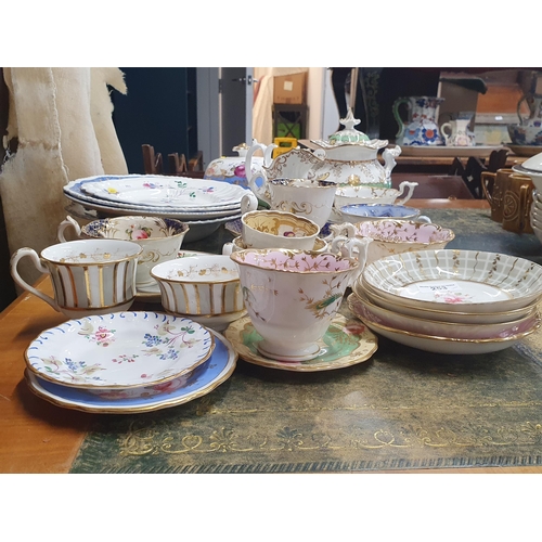 253 - A selection of 19th Century painted porcelain including Cups, Saucers, Sucrier, Milk Jug, Muffin Dis... 