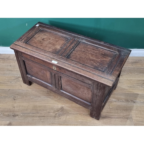 10 - An Antique oak panelled Coffer, with interior candle box 3ft 1in W x 1ft 9in H (R2)