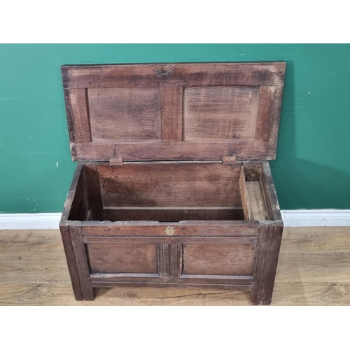 10 - An Antique oak panelled Coffer, with interior candle box 3ft 1in W x 1ft 9in H (R2)