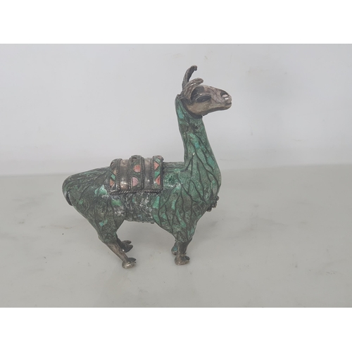 100 - Four Peruvian silver and mosaic inlaid Figures of two llamas and two standing figures, approx 5in