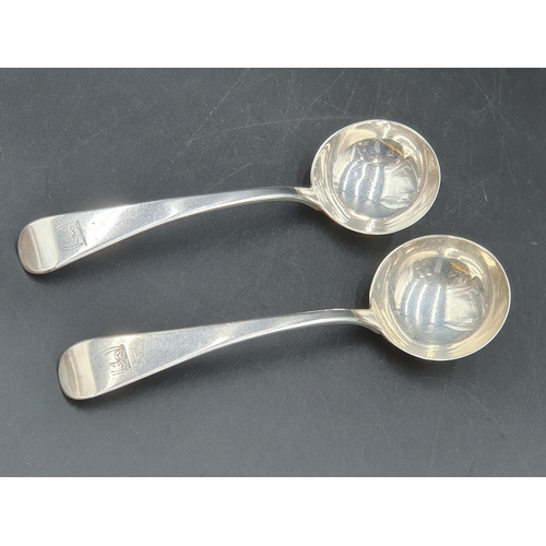 129 - A pair of William IV silver Sauce Ladles old english pattern engraved crests, London 1837, maker: S.... 