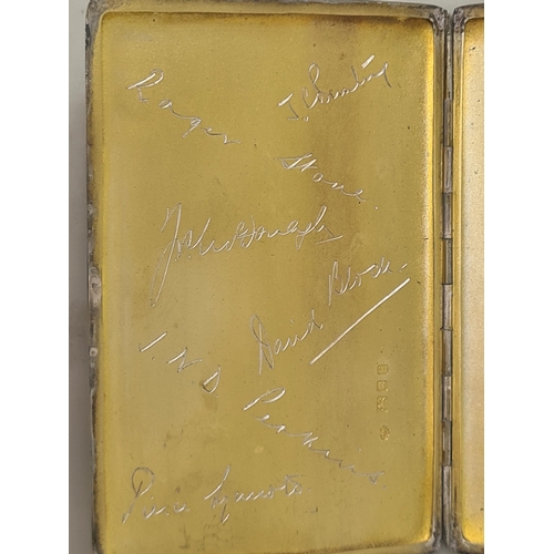 136 - A George VI silver Cigarette Case with engine turning and interior signatures, London 1940, 215gms