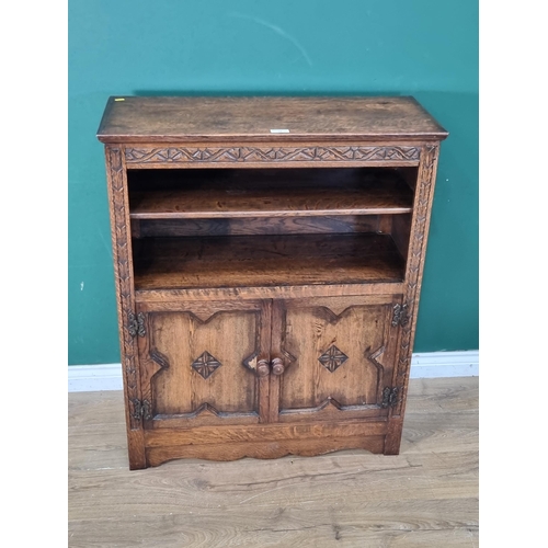 14 - An oak Bookcase fitted pair of fielded panel doors 3ft 6in H x 2ft 10in W (R2)