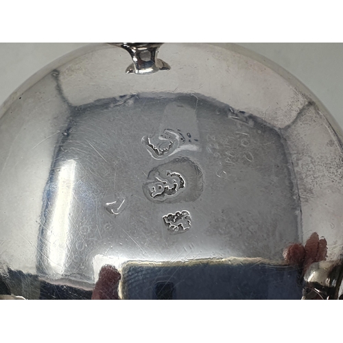 142 - Four George II silver Cauldron Salts with clear glass liners on three hoof feet, two engraved initia... 