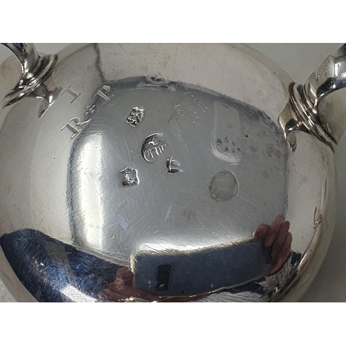 142 - Four George II silver Cauldron Salts with clear glass liners on three hoof feet, two engraved initia... 