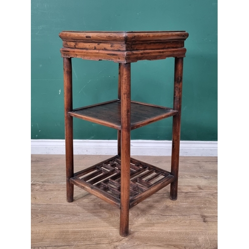 18 - A Chinese hardwood three tier Urn Stand, 2ft 7