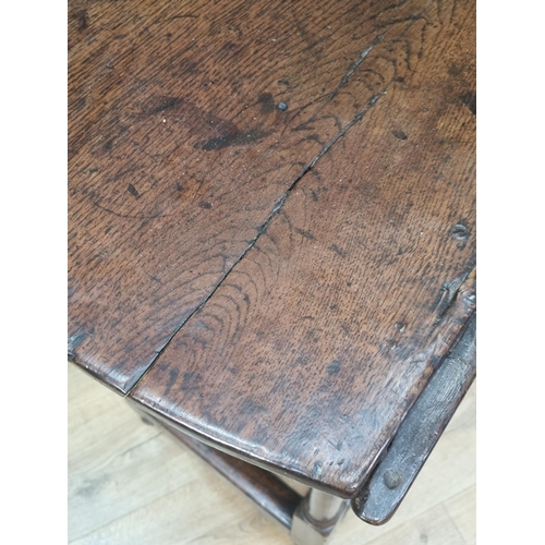 23 - An 18th Century oak Gateleg Table fitted single end drawer raised on turned supports 4ft 6in W x 2ft... 