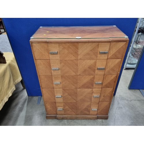 25 - An Art Deco walnut veneered breakfront Chest of five graduated drawers 4ft 2in H x 3ft W (R3)