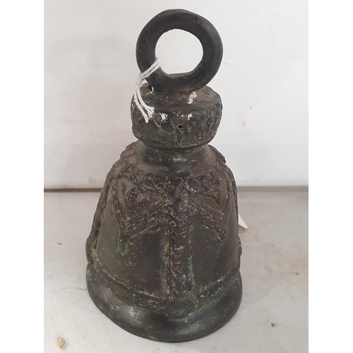 260 - An Eastern bronze ceremonial Wine Pourer, 6in H, and an old metal Bell lacking clanger, (R4)