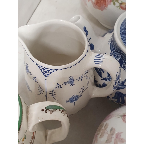 265 - Three Teapots, a Hot Water Jug, various Jugs and a Toilet Jug, (R4)