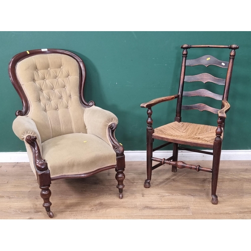 27 - A Victorian mahogany framed button back Armchair and an ash ladderback Elbow Chair (R3)