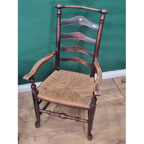 27 - A Victorian mahogany framed button back Armchair and an ash ladderback Elbow Chair (R3)