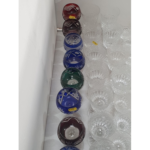 280 - Eight coloured glass Hock Glasses, a quantity of various Drinking Glasses and two glass Plates, (R4)