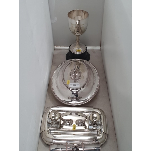 302 - A quantity of plated items including two Inkstands, an oval Entree Dish and Cover, and an engraved T... 