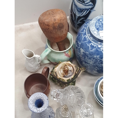 306 - A blue and white Lamp Base, a pair of floral Vases, five shell-shaped Teapots, Art Glass Jugs, Vases... 