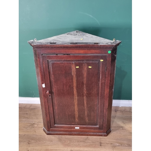 31 - An antique oak hanging Corner Cupboard 3ft 9in H x 2ft 10in W (R3)