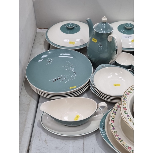 329 - A quantity of Royal Doulton 'Spindrift' dinner and coffee ware including Plates, Coffee Pot, Tureens... 