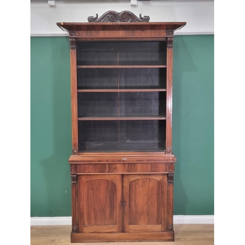 38 - A Victorian rosewood Bookcase the upper section fitted with adjustable shelves above base fitted sin... 